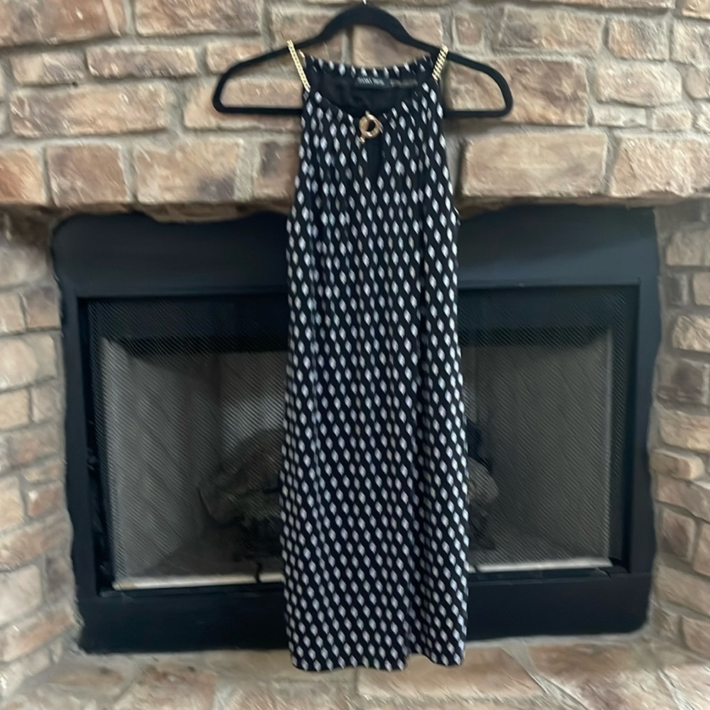 NWOT Ivanka Trump black and white keyhole  dress with gold straps and detail. M